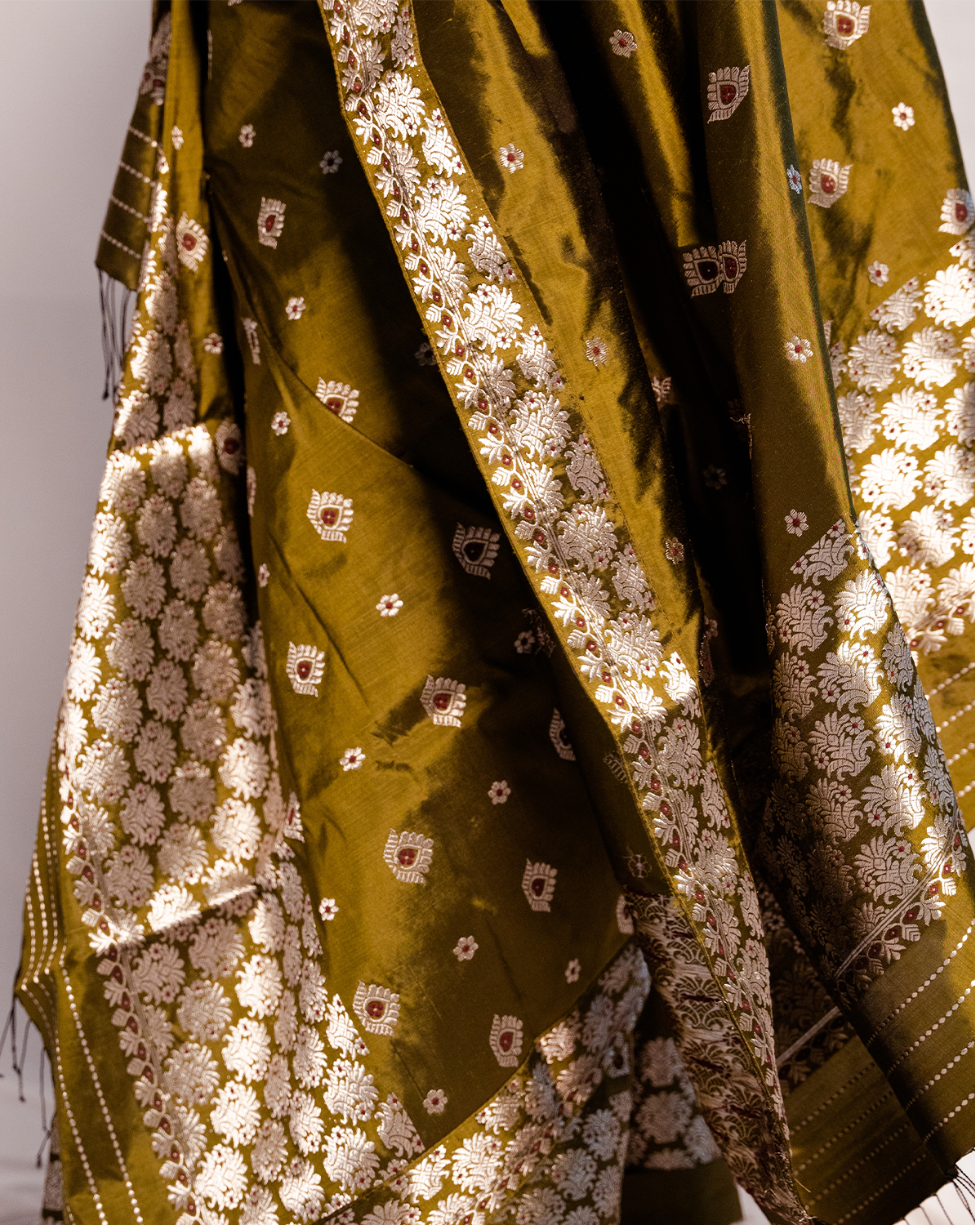 Urvi Olive Green Paat Silk Mekhela Sador